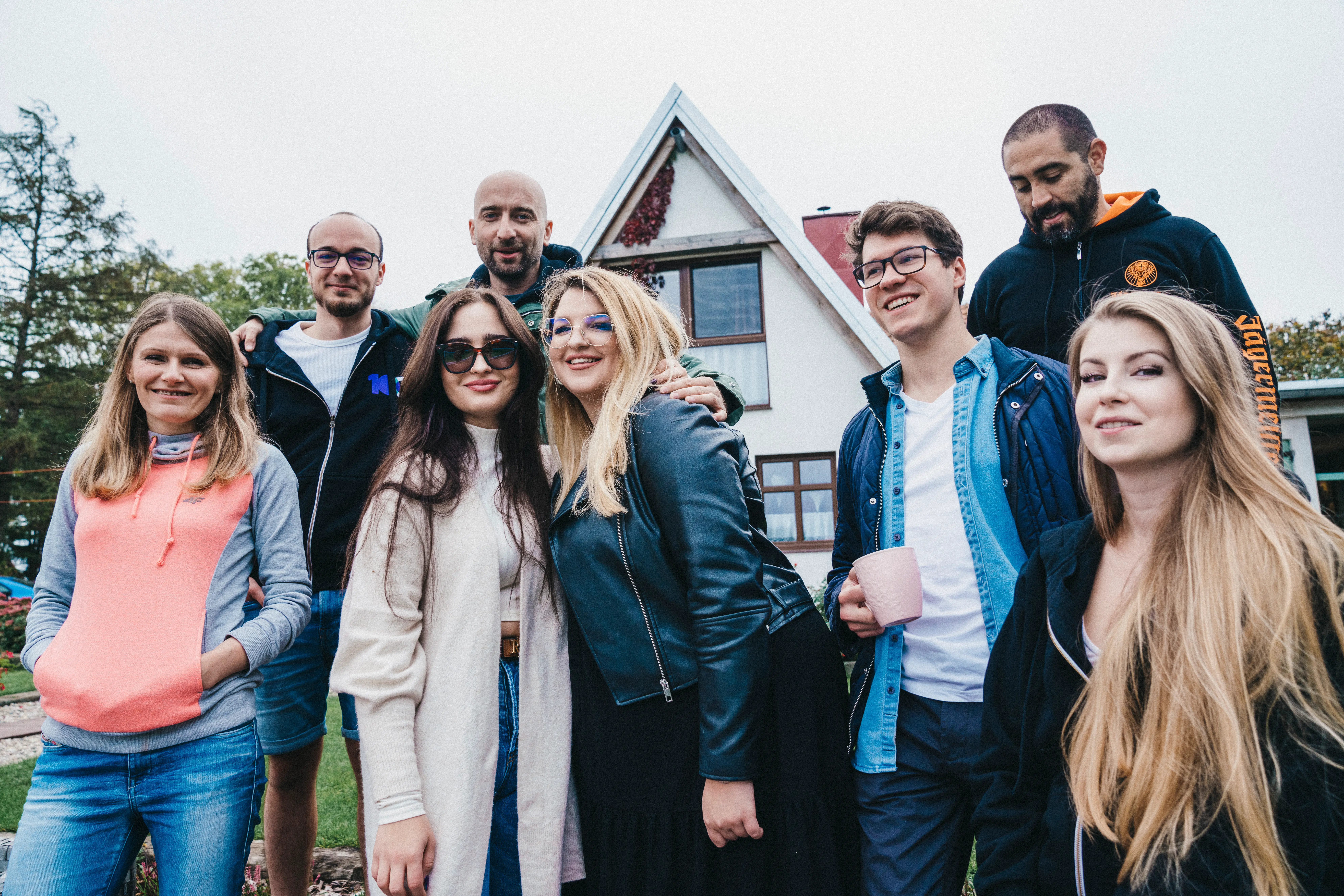 People gathered on the steps outside our workation lodge